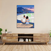 Personalized couple canvas of a couple sitting at a cliff edge overlooking a custom city street map at sunset, with a heartbeat monogram of their initials, GPS coordinates, and city name — LOVECOUPLET
