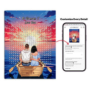 Personalized couple word search canvas with a couple in a rowboat at sunset, the 10 reasons they love each other circled in a custom word search, and monogrammed initials carved into the boat — LOVECOUPLET
