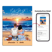 Personalized couple canvas of two people sitting together on a beach picnic blanket at sunset, with a custom romantic quote above the ocean and their names written in the sand — LOVECOUPLET