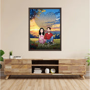 All Along It Was You personalized couple portrait framed canvas of two front-facing people sitting together in a golden meadow at sunset, with custom lyrics shaped into a heart above them and their names displayed at the bottom — LOVECOUPLET