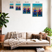 Personalized couple framed canvas of two people holding hands on motorcycles at sunset, with custom lyrics shaped into a heart above the open road and their names displayed at the bottom — LOVECOUPLET