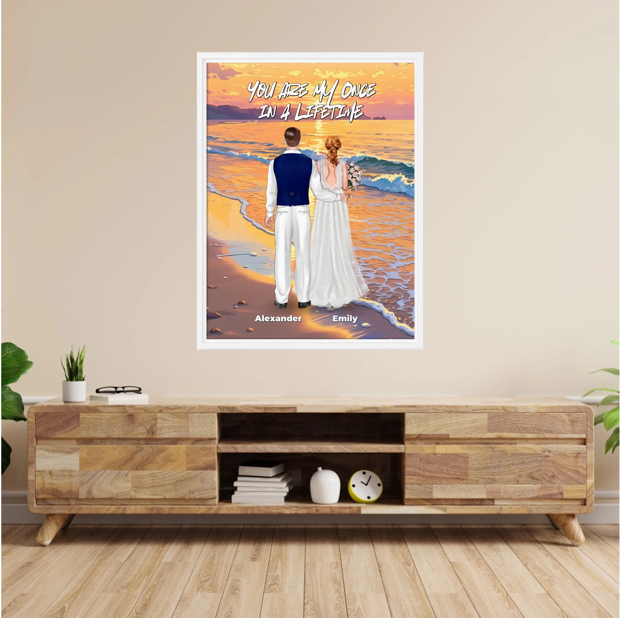 Once in a Lifetime personalized wedding couple framed canvas of two people standing together on a golden beach at sunset, with a custom romantic quote above them, names displayed at the bottom, and personalized wedding characters — LOVECOUPLET