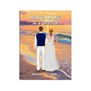 Once in a Lifetime personalized wedding couple canvas of two people standing together on a golden beach at sunset, with a custom romantic quote above them, names displayed at the bottom, and personalized wedding characters — LOVECOUPLET