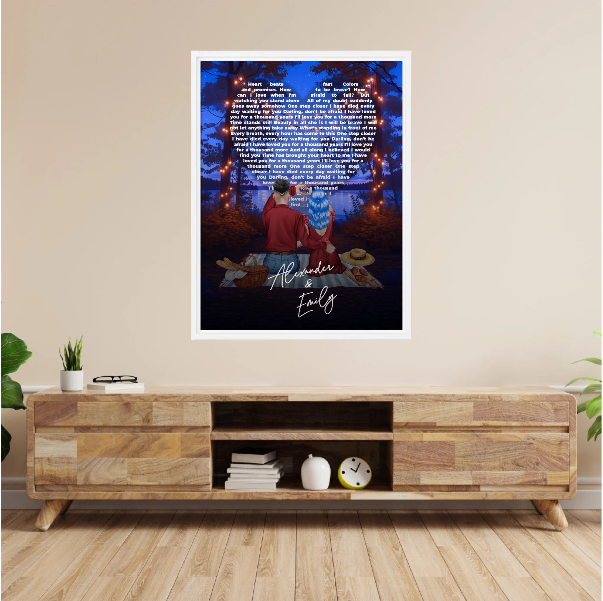 Our Song Under the Stars personalized couple framed canvas of two people sitting together by the water at night under glowing string lights, with custom lyrics shaped into a heart above them and handwritten names displayed at the bottom — LOVECOUPLET