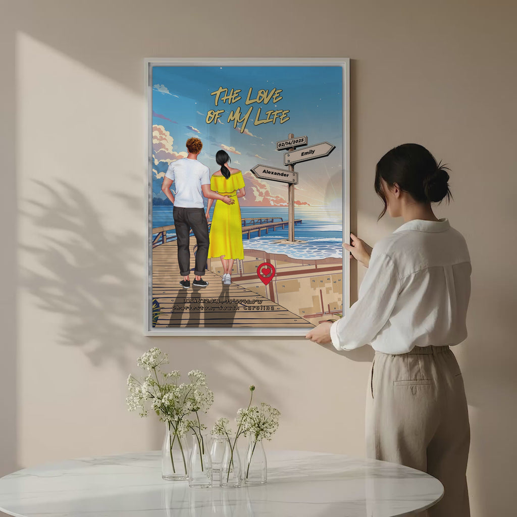 Personalized couple canvas of a man and woman walking a sunset boardwalk, with a wooden signpost showing custom names and date, plus a custom location map and GPS coordinates built into the shore — LOVECOUPLET