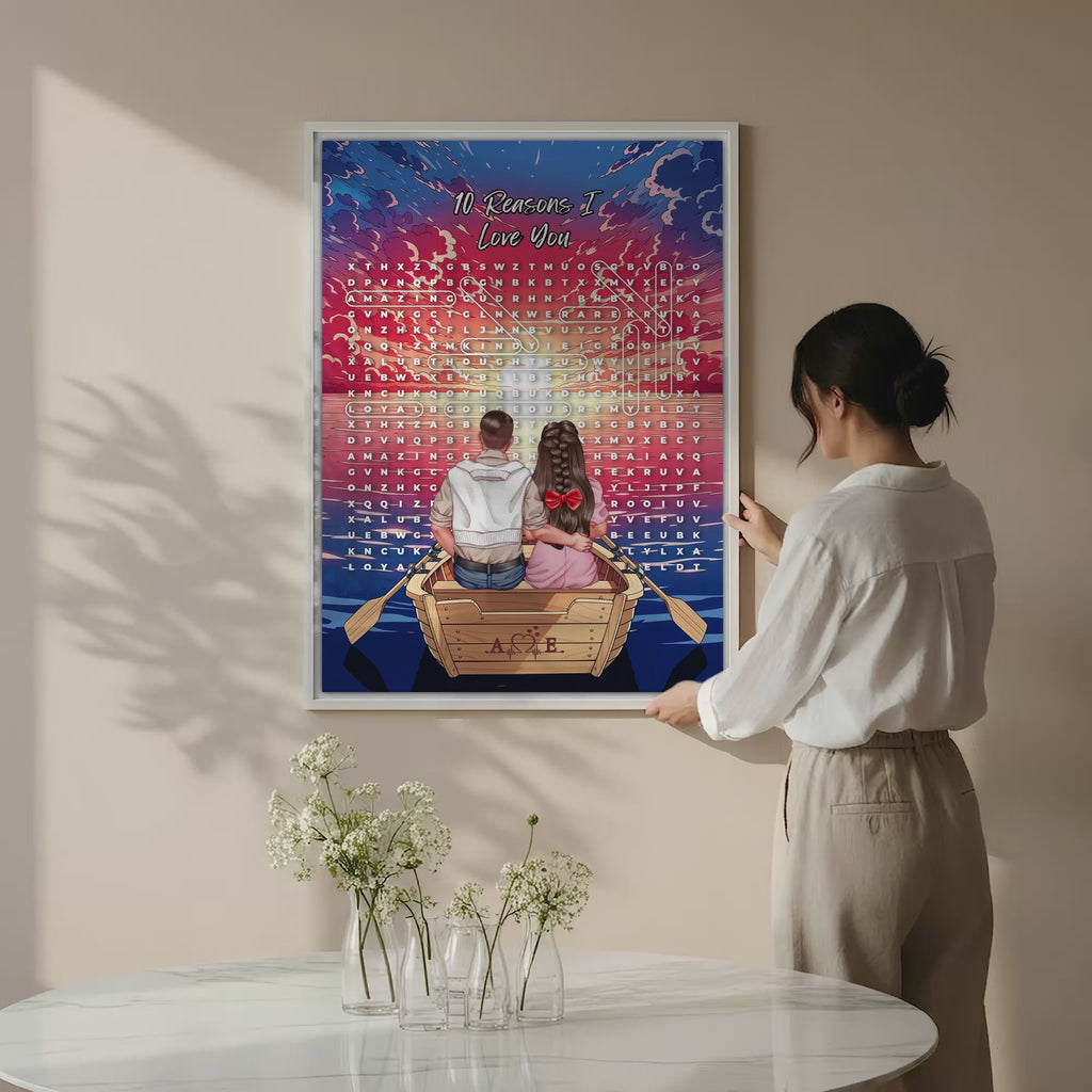 Personalized couple word search canvas with a couple in a rowboat at sunset, the 10 reasons they love each other circled in a custom word search, and monogrammed initials carved into the boat — LOVECOUPLET