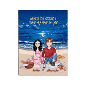 Personalized couple portrait canvas of two front-facing people sitting together on a beach picnic blanket under the stars, with customizable facial features, adult and senior couple options — LOVECOUPLET