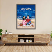 Personalized couple portrait framed canvas of two front-facing people sitting together on a beach picnic blanket under the stars, with customizable facial features, adult and senior couple options — LOVECOUPLET