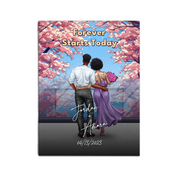 You & Me Always personalized couple canvas of two people standing together beneath blooming pink flowers, with a custom title, handwritten names, date, and personalized characters — LOVECOUPLET